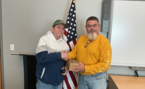 New member receives free radio from club president, N4CMD